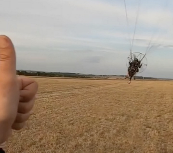 Tandem paramotor in flight